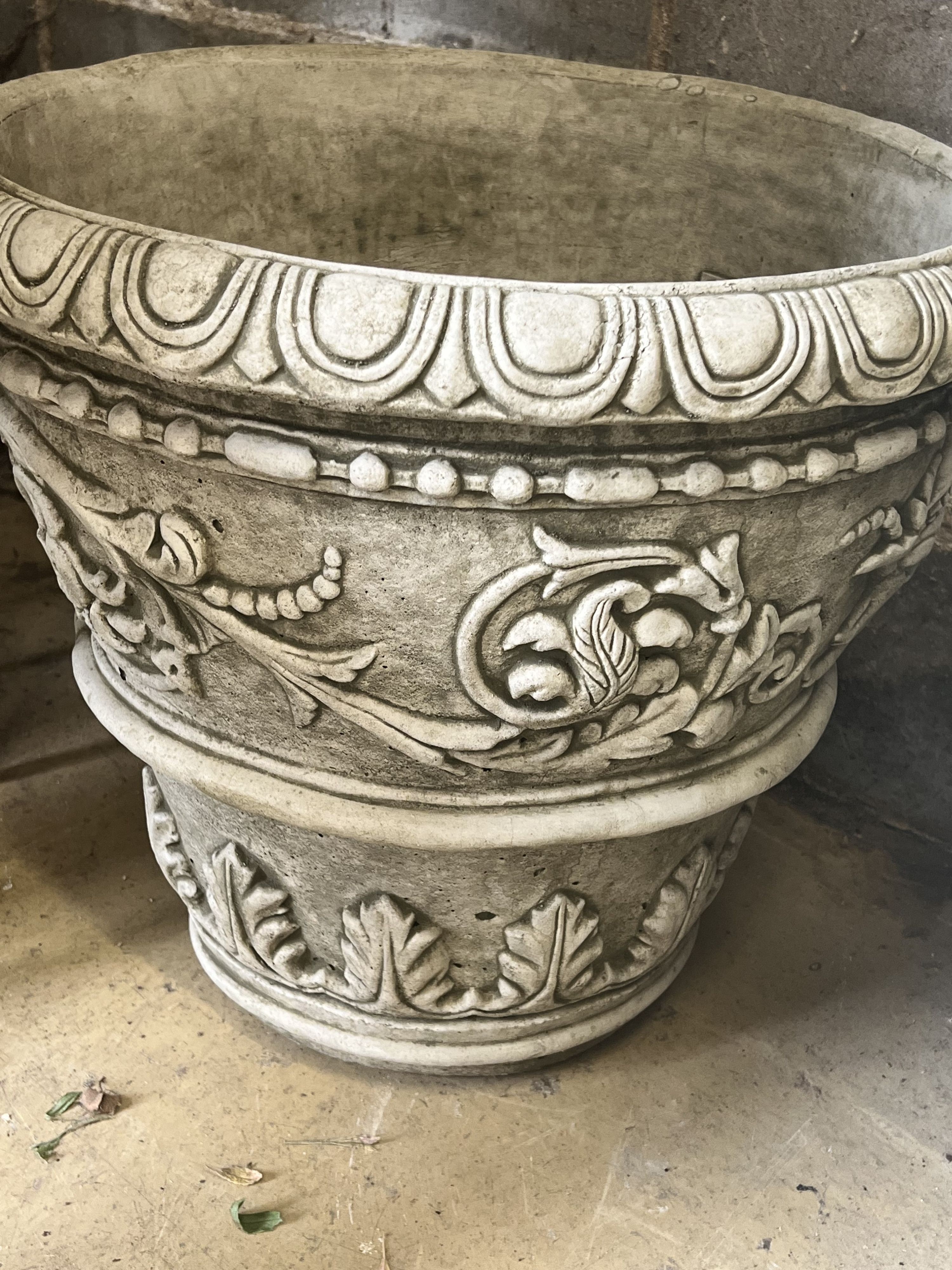 A pair of large reconstituted stone circular garden planters, diameter 55cm height 49cm